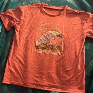 This is a large short sleeve t-shirt from SHEIN and is a light pink color.